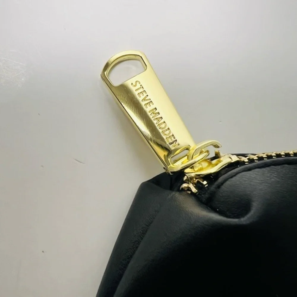 Steve Madden solid black makeup pouch or clutch